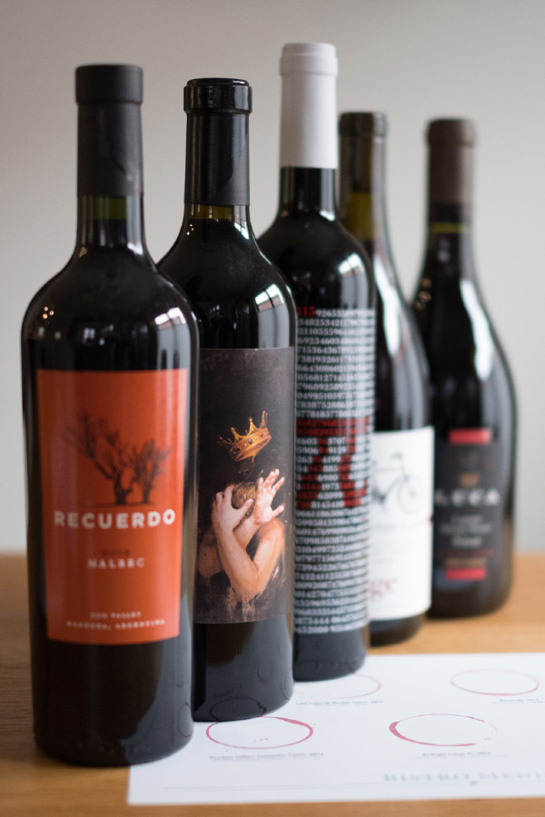 image of five bottles of red wine